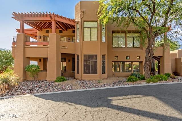 exterior space featuring a balcony