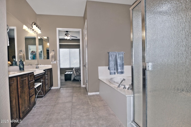 bathroom featuring tile patterned flooring, shower with separate bathtub, vanity, and ceiling fan