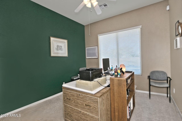 office with light colored carpet and ceiling fan