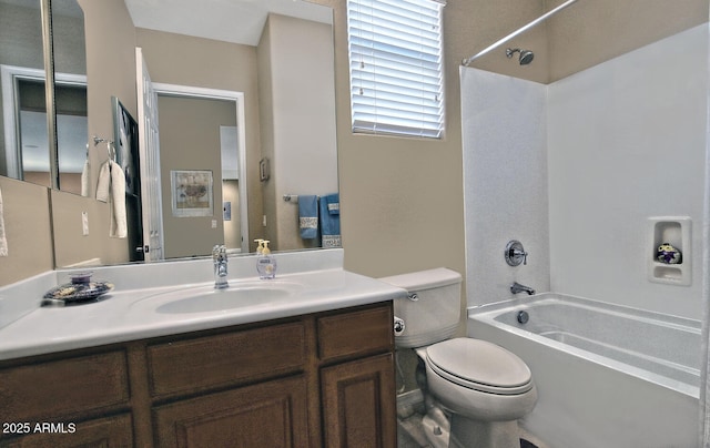 full bathroom with vanity, shower / bathtub combination, and toilet