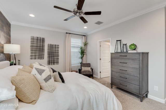 bedroom with light carpet, ceiling fan, and crown molding