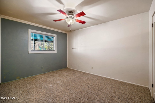 empty room featuring carpet flooring, a ceiling fan, and ornamental molding