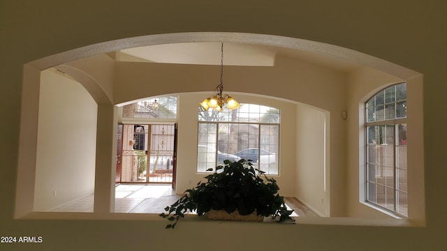 interior space with a notable chandelier