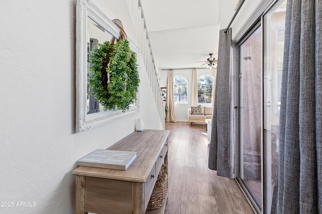 corridor with wood finished floors