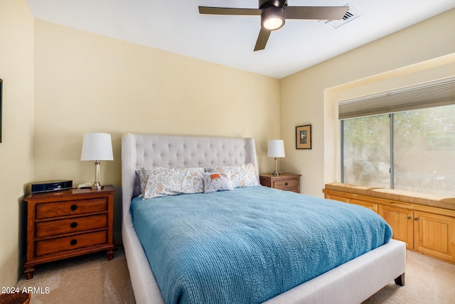 carpeted bedroom featuring ceiling fan