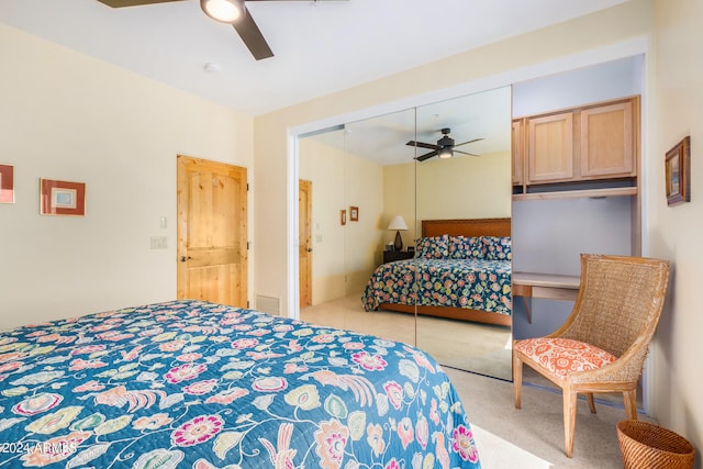 bedroom featuring light carpet, a closet, and ceiling fan