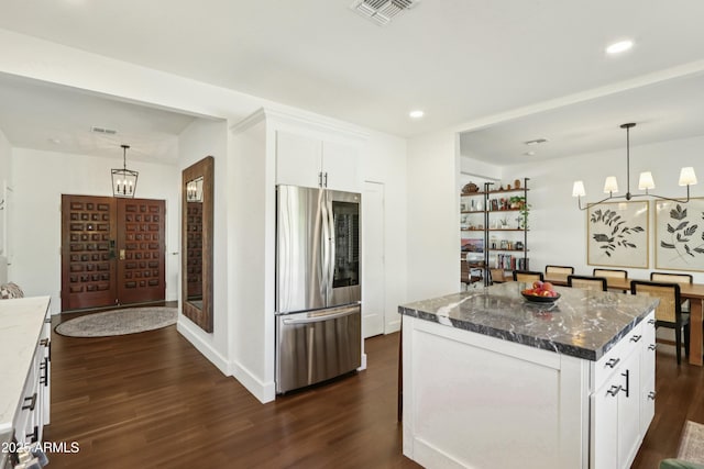 4525 N 66th St Unit 1, Scottsdale, AZ 85251 - kitchen with smart refrigerator, a chandelier, dark wood finished floors, white cabinets, and recessed lighting