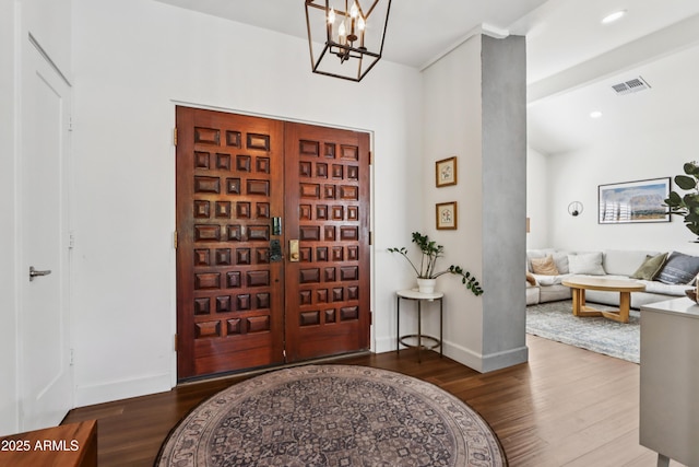 4525 N 66th St Unit 1, Scottsdale, AZ 85251 - foyer with wood finished floors and a chandelier