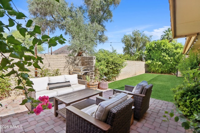 4525 N 66th St Unit 1, Scottsdale, AZ 85251 - fenced backyard with a patio, outdoor lounge area, and area for grilling