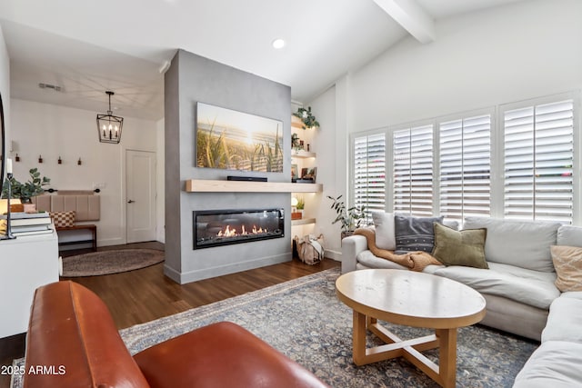 4525 N 66th St Unit 1, Scottsdale, AZ 85251 - living room with wood finished floors, a glass covered fireplace, a chandelier, and recessed lighting