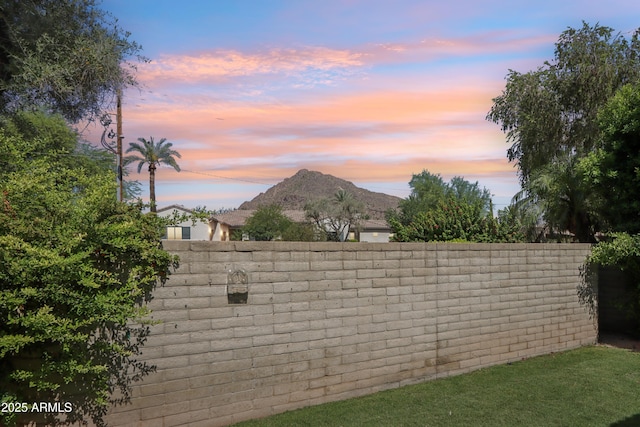 4525 N 66th St Unit 1, Scottsdale, AZ 85251 - yard at dusk featuring a mountain view