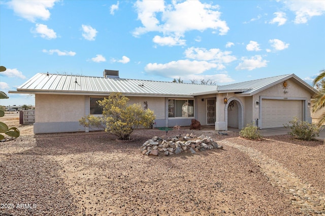 ranch-style house featuring a garage