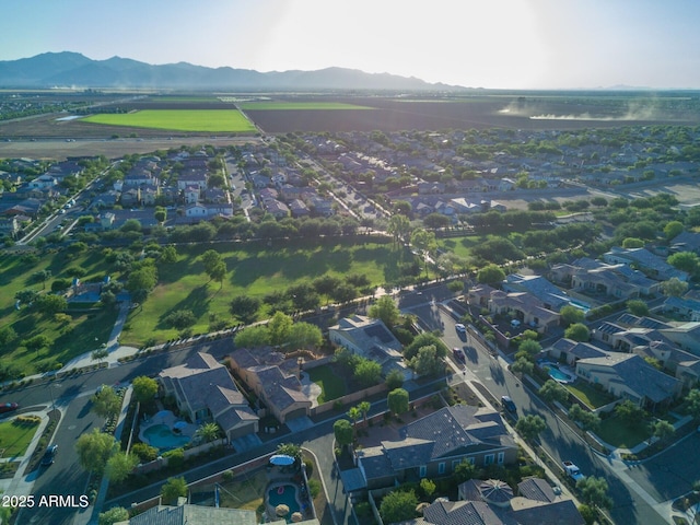 drone / aerial view with a mountain view and a residential view