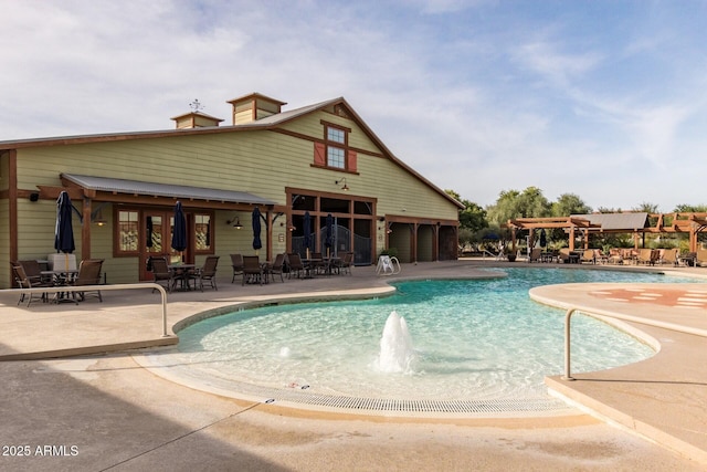 pool featuring a patio area