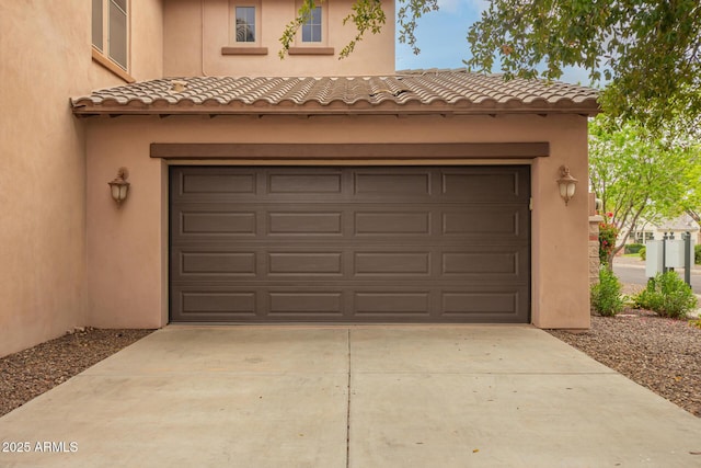 garage with driveway