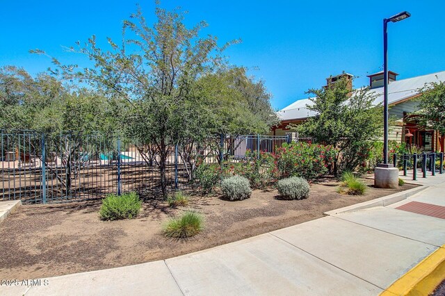 view of yard with a patio and fence