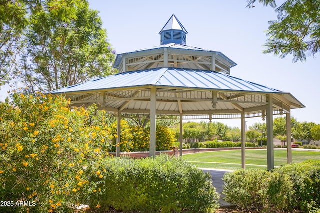 surrounding community featuring a gazebo and a yard