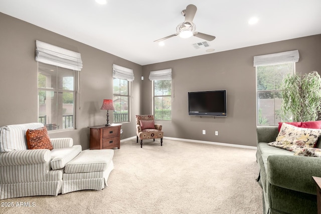 living room with visible vents, ceiling fan, baseboards, carpet, and recessed lighting