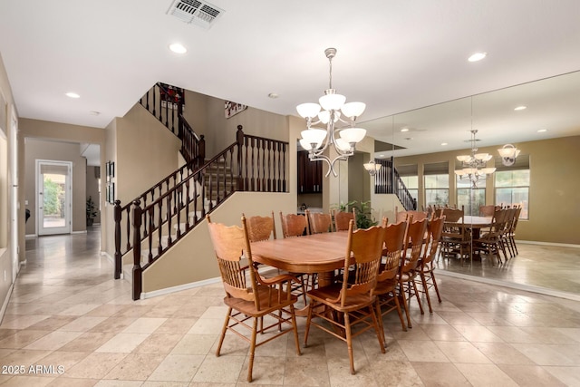 dining room featuring stairway, visible vents, baseboards, recessed lighting, and a notable chandelier