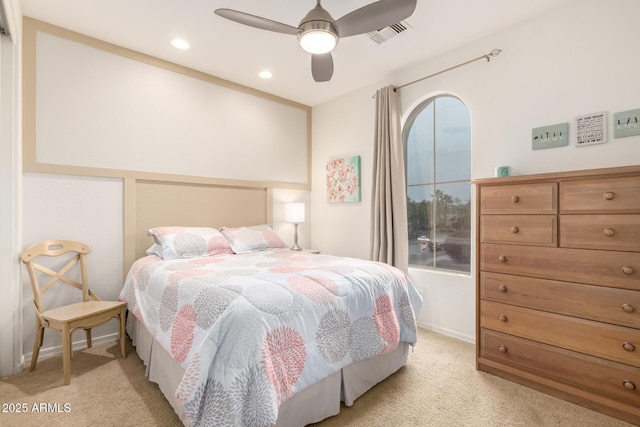 bedroom with ceiling fan, recessed lighting, visible vents, and light carpet