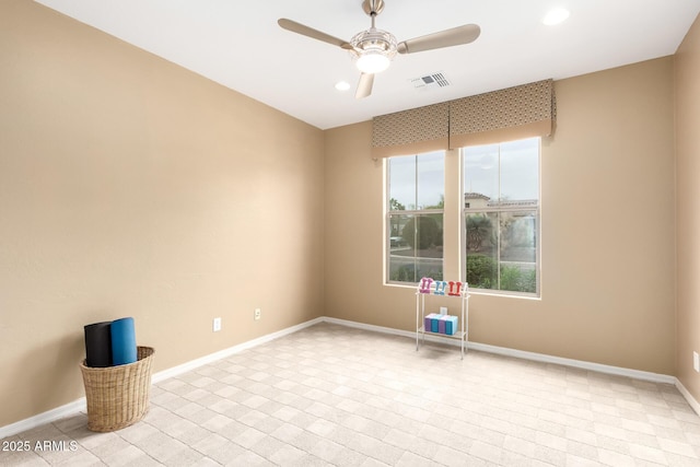 spare room with recessed lighting, baseboards, visible vents, and ceiling fan