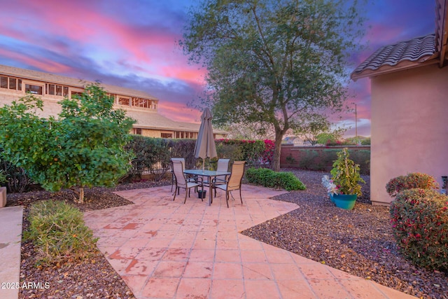 patio terrace at dusk with fence