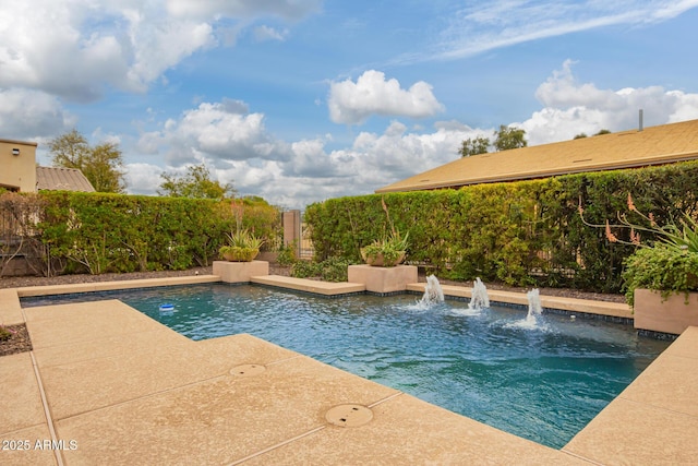 view of pool featuring a patio and fence