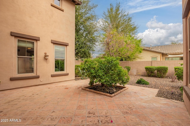 view of patio / terrace with fence