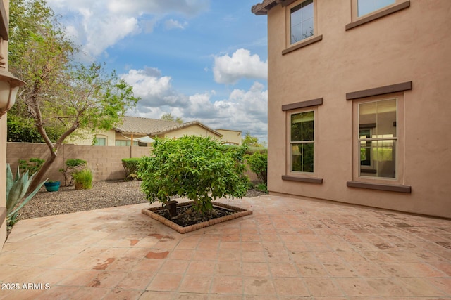 view of patio with fence