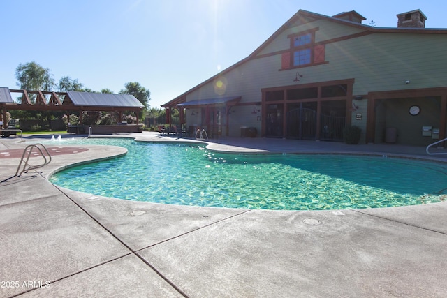 community pool featuring a patio