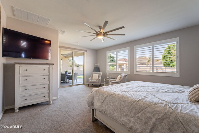 bedroom featuring carpet, ceiling fan, and access to outside