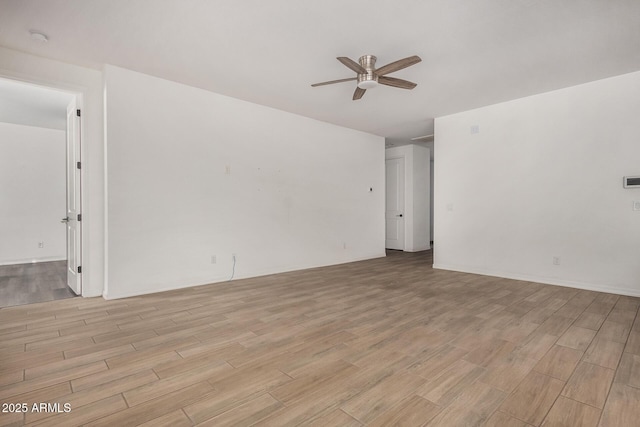 unfurnished room featuring ceiling fan