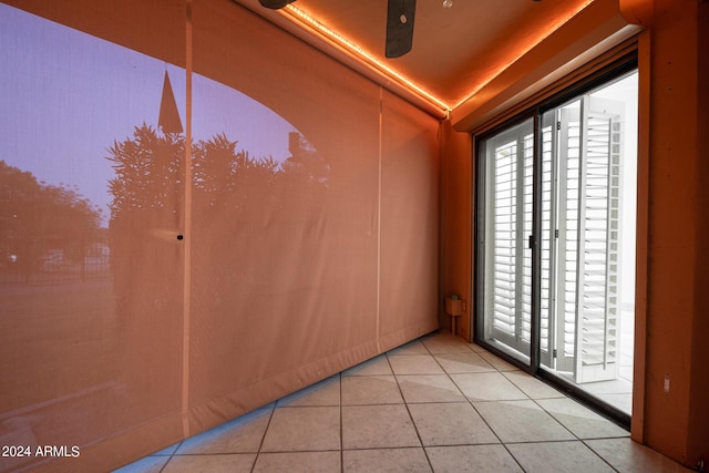 spare room featuring light tile patterned floors