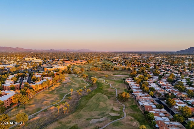 aerial view at dusk with a mountain view