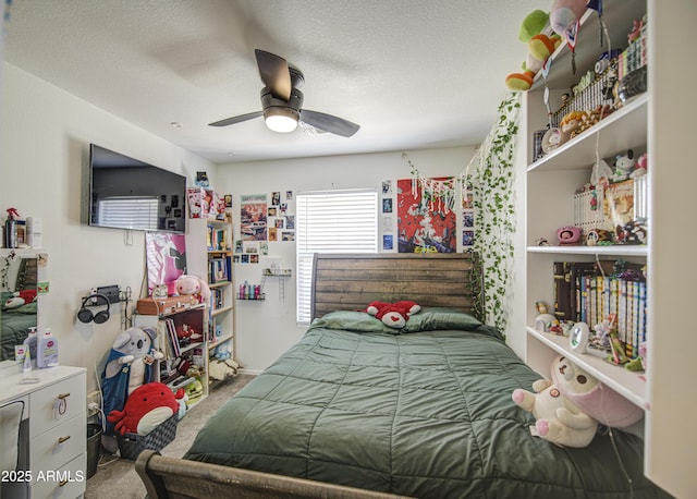 1107 E Ln Salle St, Phoenix, AZ 85040 - carpeted bedroom featuring ceiling fan and a textured ceiling