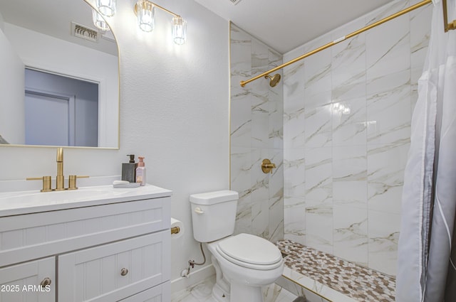 1107 E Ln Salle St, Phoenix, AZ 85040 - full bath with marble look tiles, vanity, and a tile shower