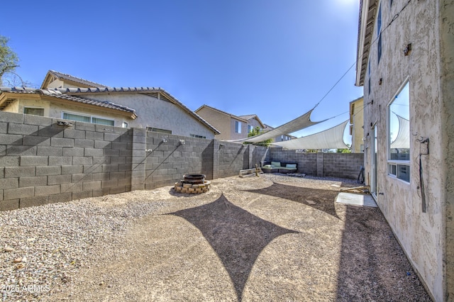 1107 E Ln Salle St, Phoenix, AZ 85040 - fenced backyard featuring a fire pit