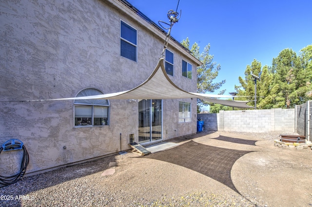 1107 E Ln Salle St, Phoenix, AZ 85040 - back of property with a fenced backyard, a patio area, and stucco siding