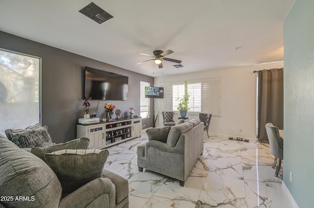 1107 E Ln Salle St, Phoenix, AZ 85040 - living room featuring ceiling fan and marble finish floors