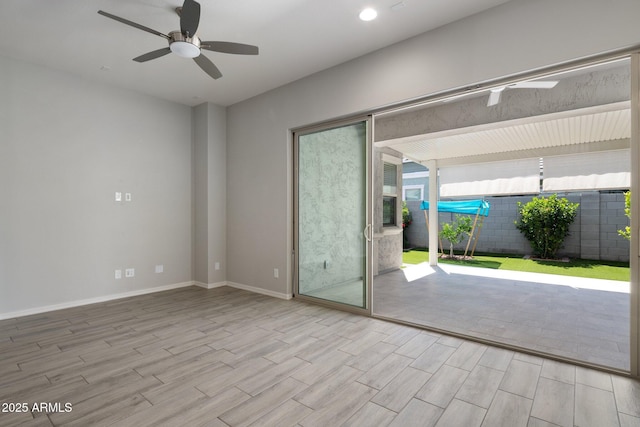 2644 S Dock St, Gilbert, AZ 85295 - empty room featuring baseboards, a ceiling fan, recessed lighting, and wood finished floors