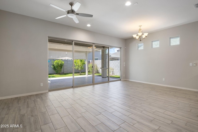 2644 S Dock St, Gilbert, AZ 85295 - unfurnished room featuring visible vents, wood finished floors, baseboards, recessed lighting, and ceiling fan with notable chandelier