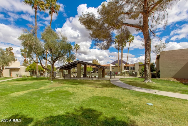 surrounding community featuring a gazebo and a yard