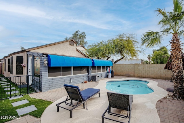 view of pool featuring a patio