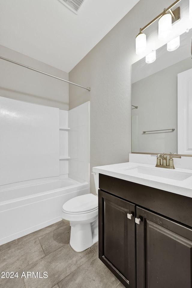 full bathroom featuring shower / tub combination, vanity, and toilet