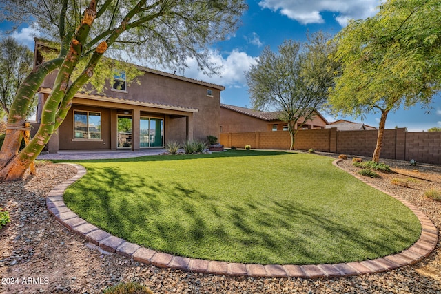 view of yard with a patio area