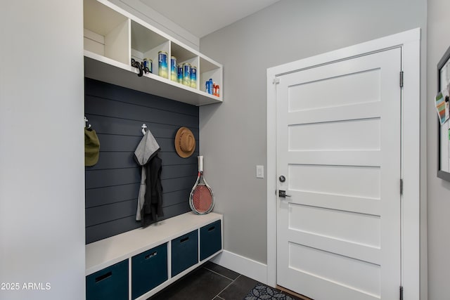 4331 N 19th Pl, Phoenix, AZ 85016 - mudroom featuring dark tile patterned floors and baseboards