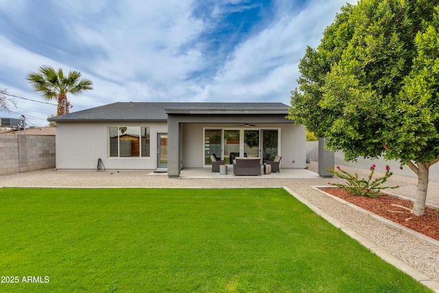 4331 N 19th Pl, Phoenix, AZ 85016 - rear view of property featuring a yard, a patio area, ceiling fan, and stucco siding