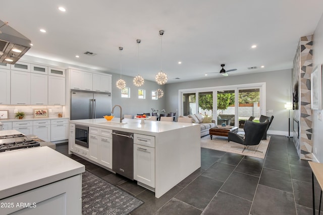 4331 N 19th Pl, Phoenix, AZ 85016 - kitchen with a healthy amount of sunlight, built in appliances, a sink, and visible vents