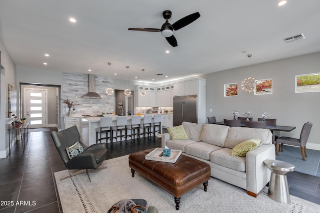 4331 N 19th Pl, Phoenix, AZ 85016 - living room featuring visible vents, baseboards, recessed lighting, and ceiling fan with notable chandelier