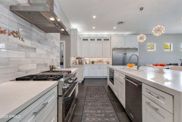4331 N 19th Pl, Phoenix, AZ 85016 - kitchen featuring tasteful backsplash, visible vents, a sink, wall chimney range hood, and high quality appliances